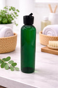 Natural Farms 4 oz Green Cosmo BPA FREE Bottles - 8 Pack Empty Refillable Containers - Essential Oils - Hair - Aromatherapy | Black Spout Cap - Made in the USA